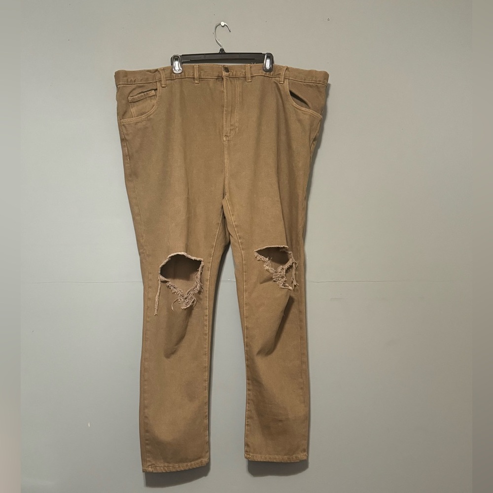 High quality NSLDV denim jeans with rips at the knees